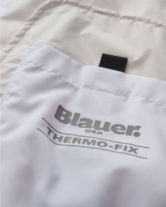 Blauer Giubbino con cappuccio antivento